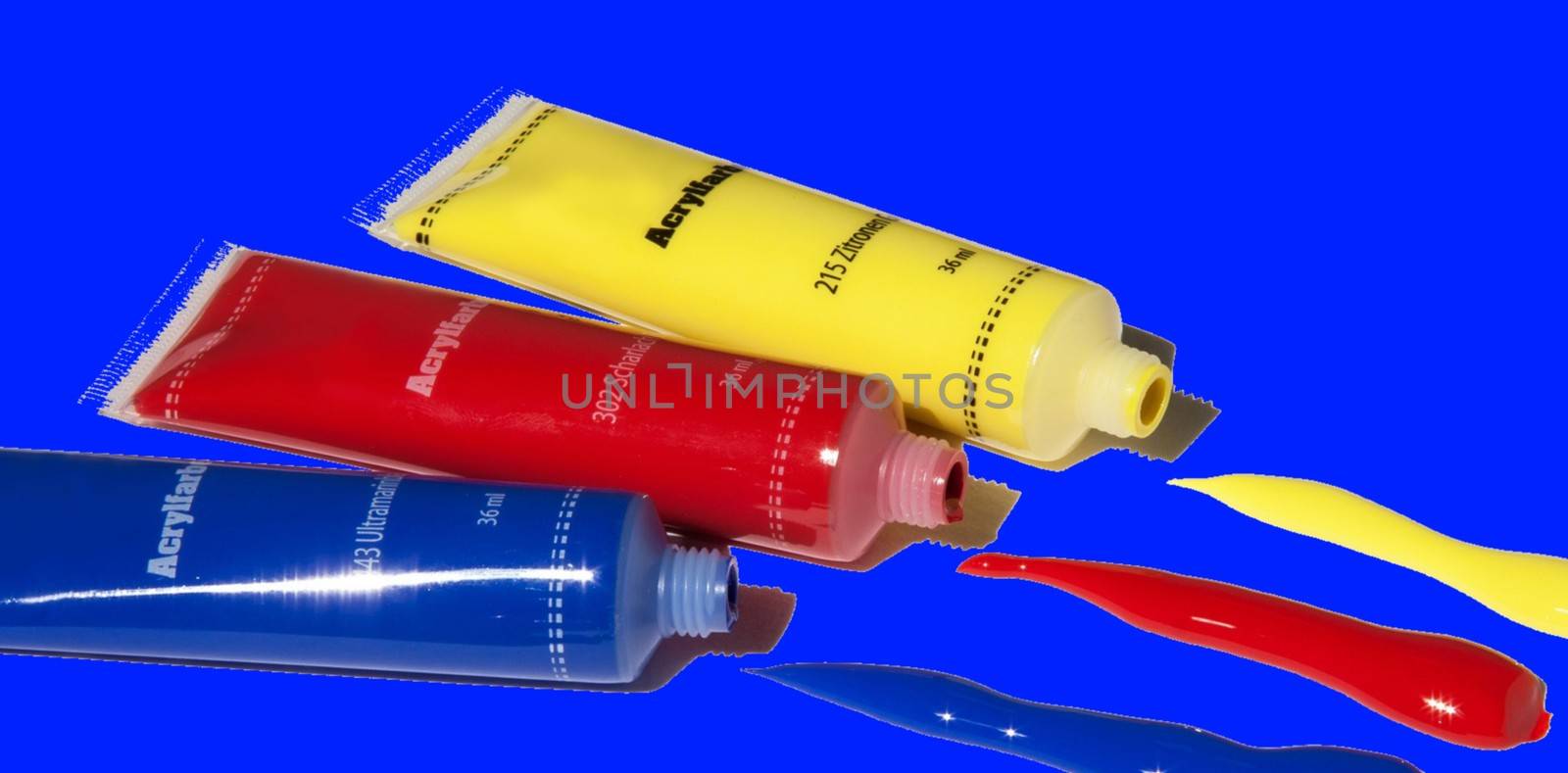 Yellow, red, blue akrill paint tubes with blue background by balage941