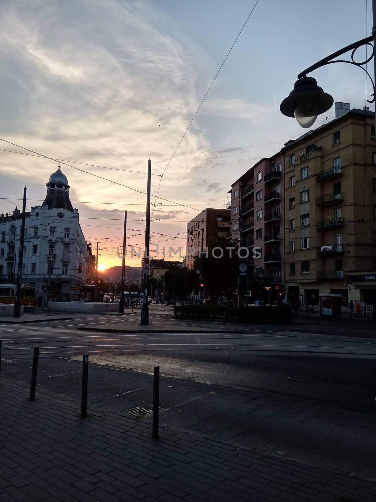 A traffic light sitting on the side of a road. High quality photo