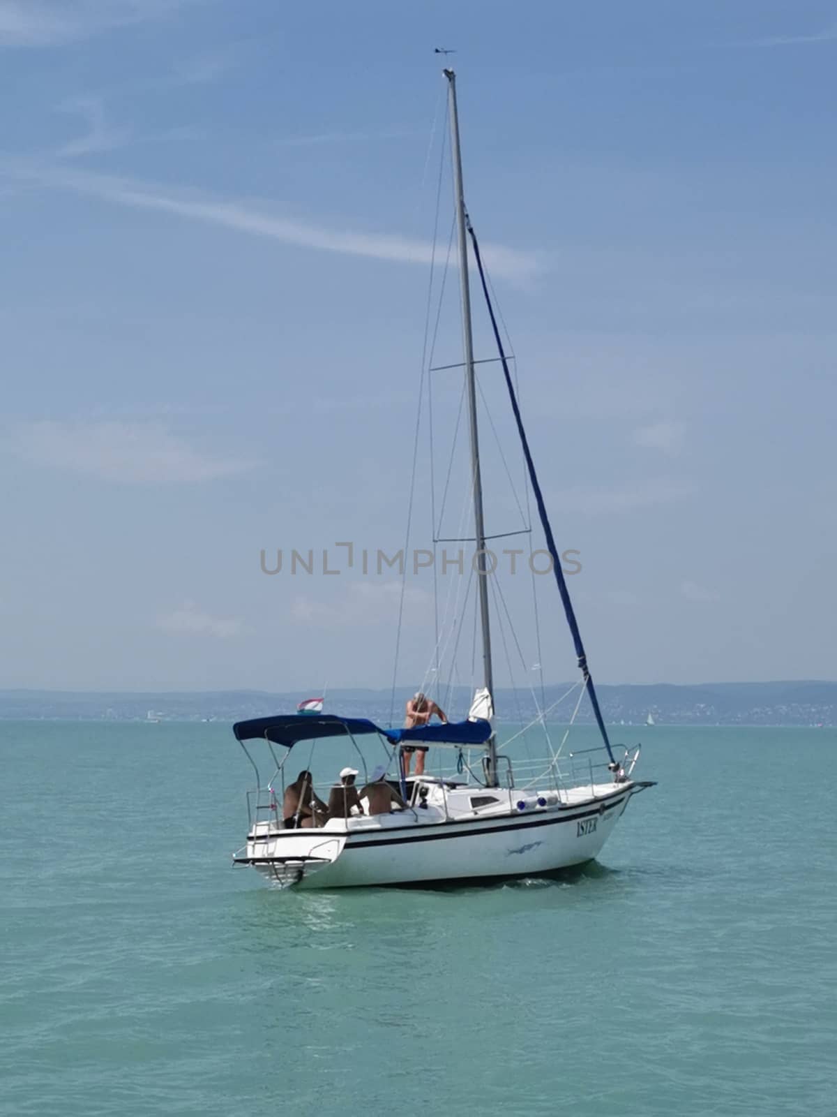 A small boat in a body of water. High quality photo