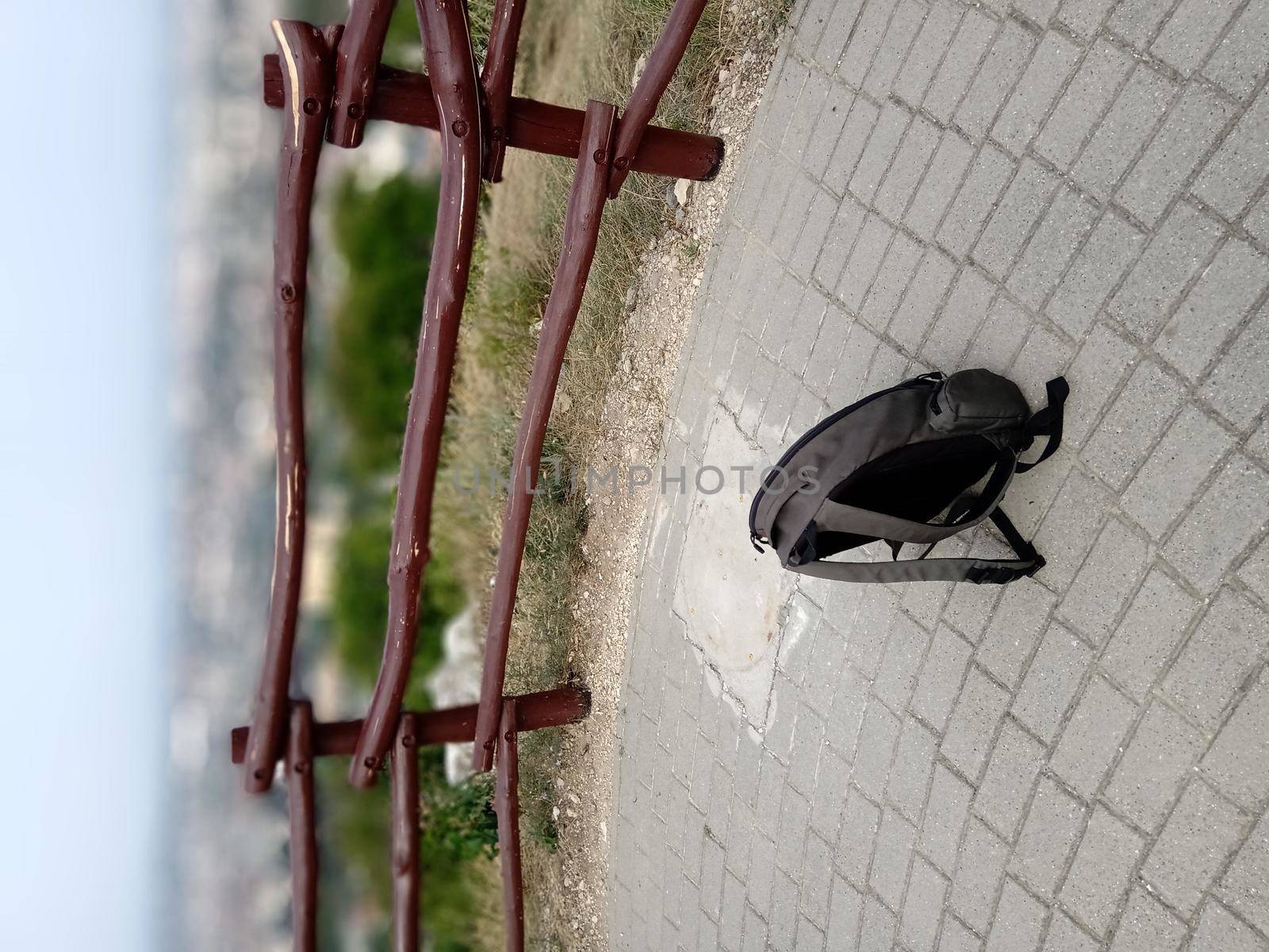 A lone backpack at the Eagle Mountain Lookout Tower in Budapest. High quality photo
