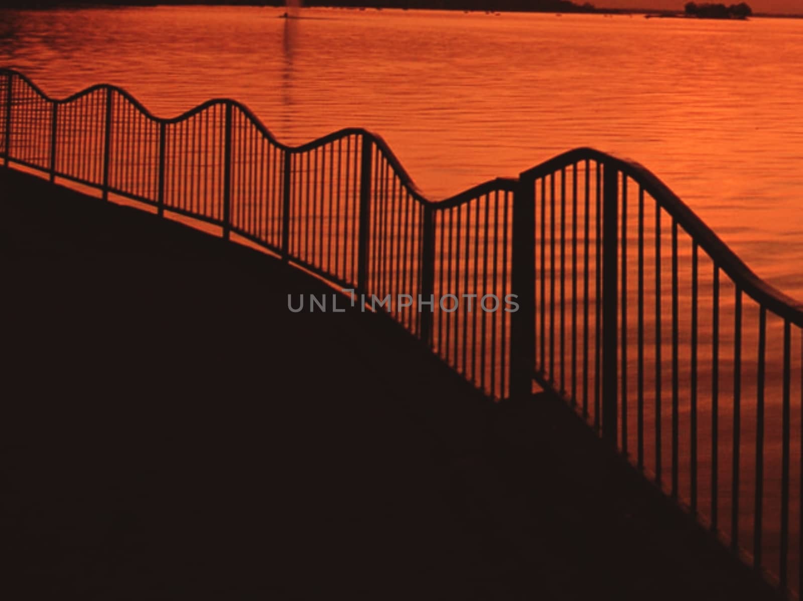 A close up of a fence with a beautiful background. High quality photo