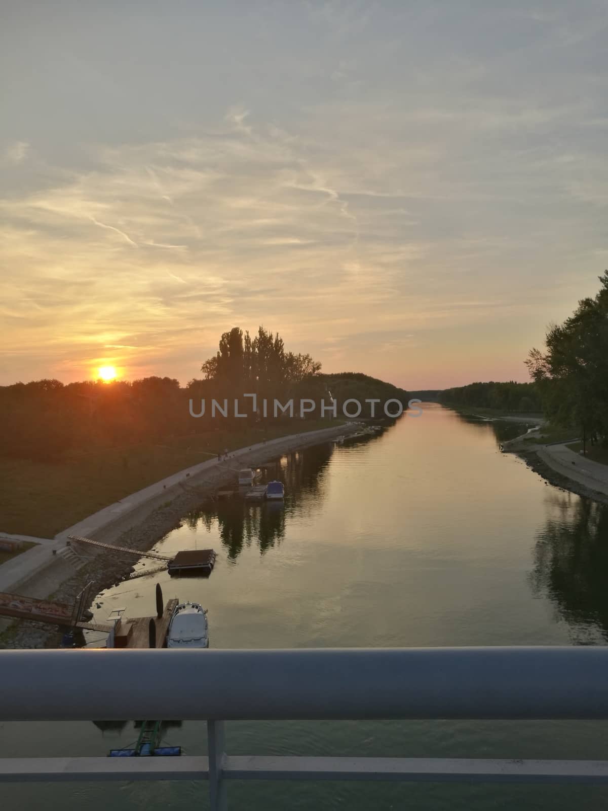 Sunset in Gy?r photographed from the bridge. High quality photo