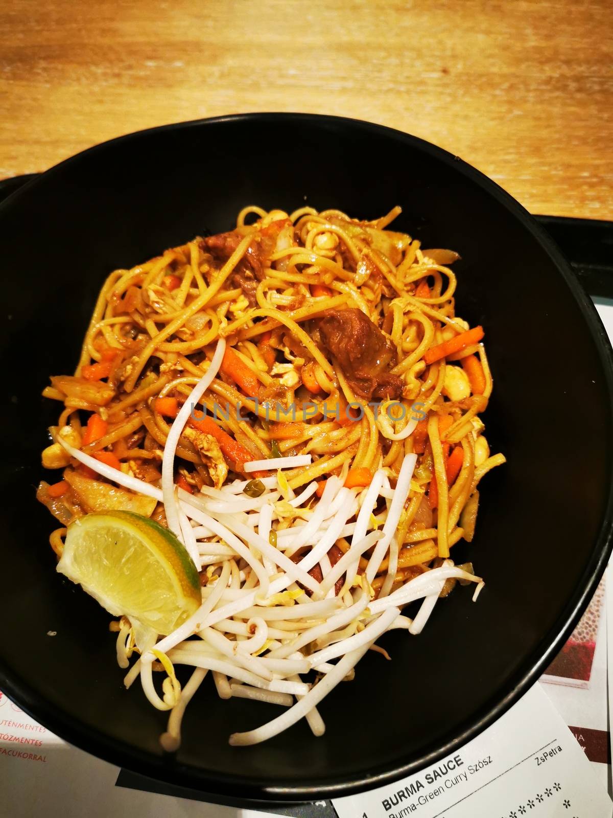 A bowl of food on a plate. High quality photo