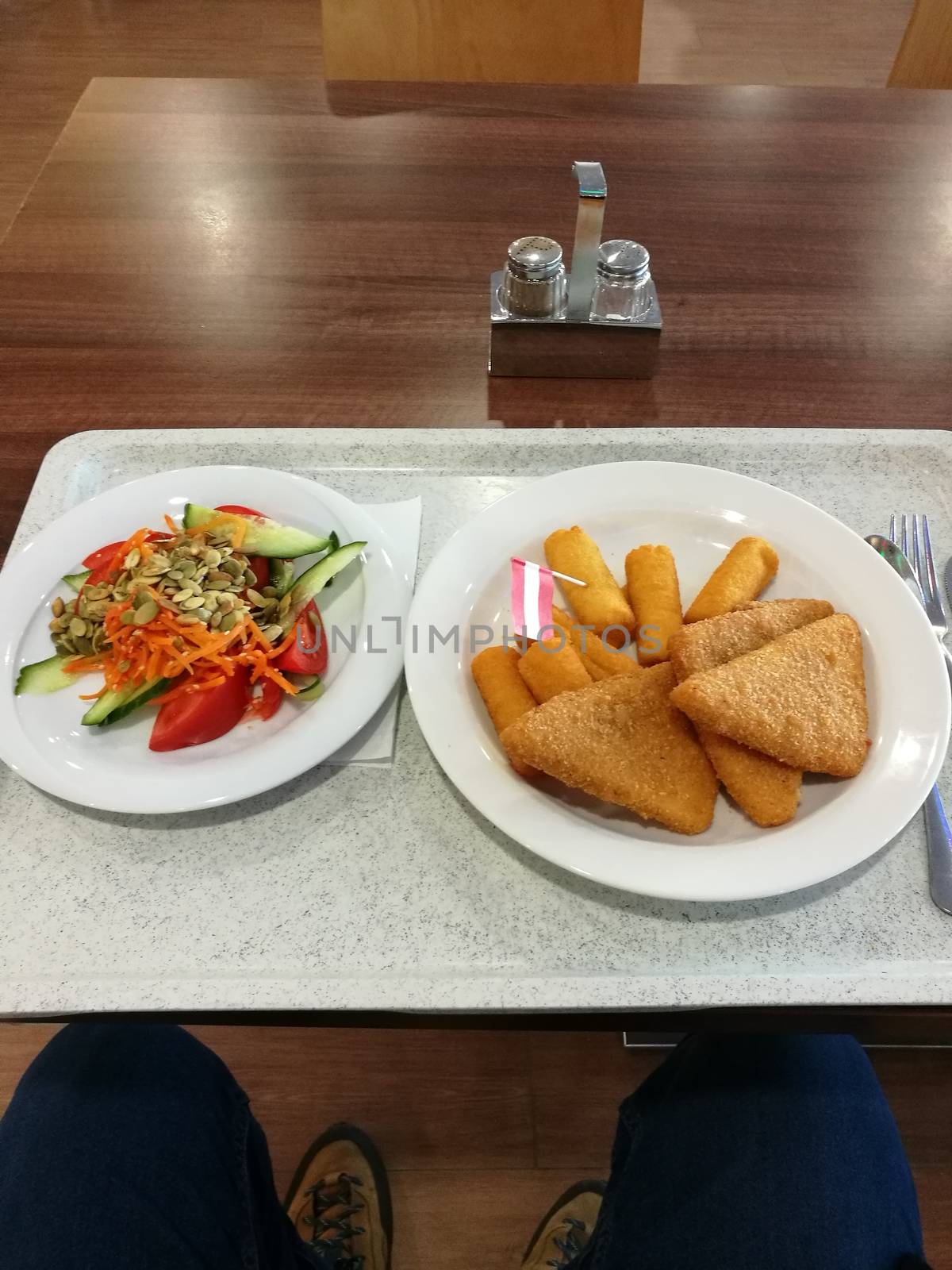 Fried cheese with croquettes and mixed salad. High quality photo