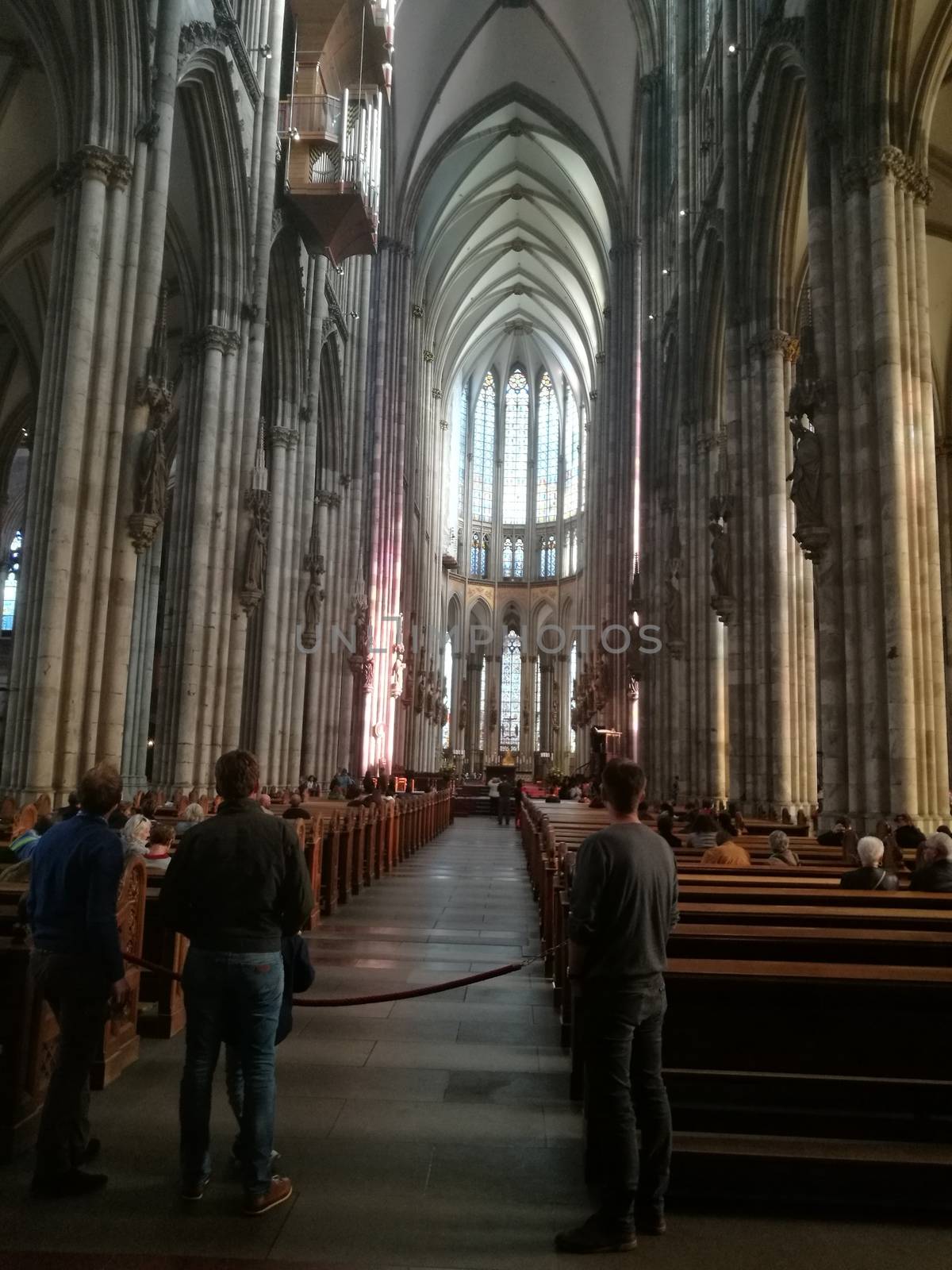 A group of people in the Cologne Cathedral. High quality photo