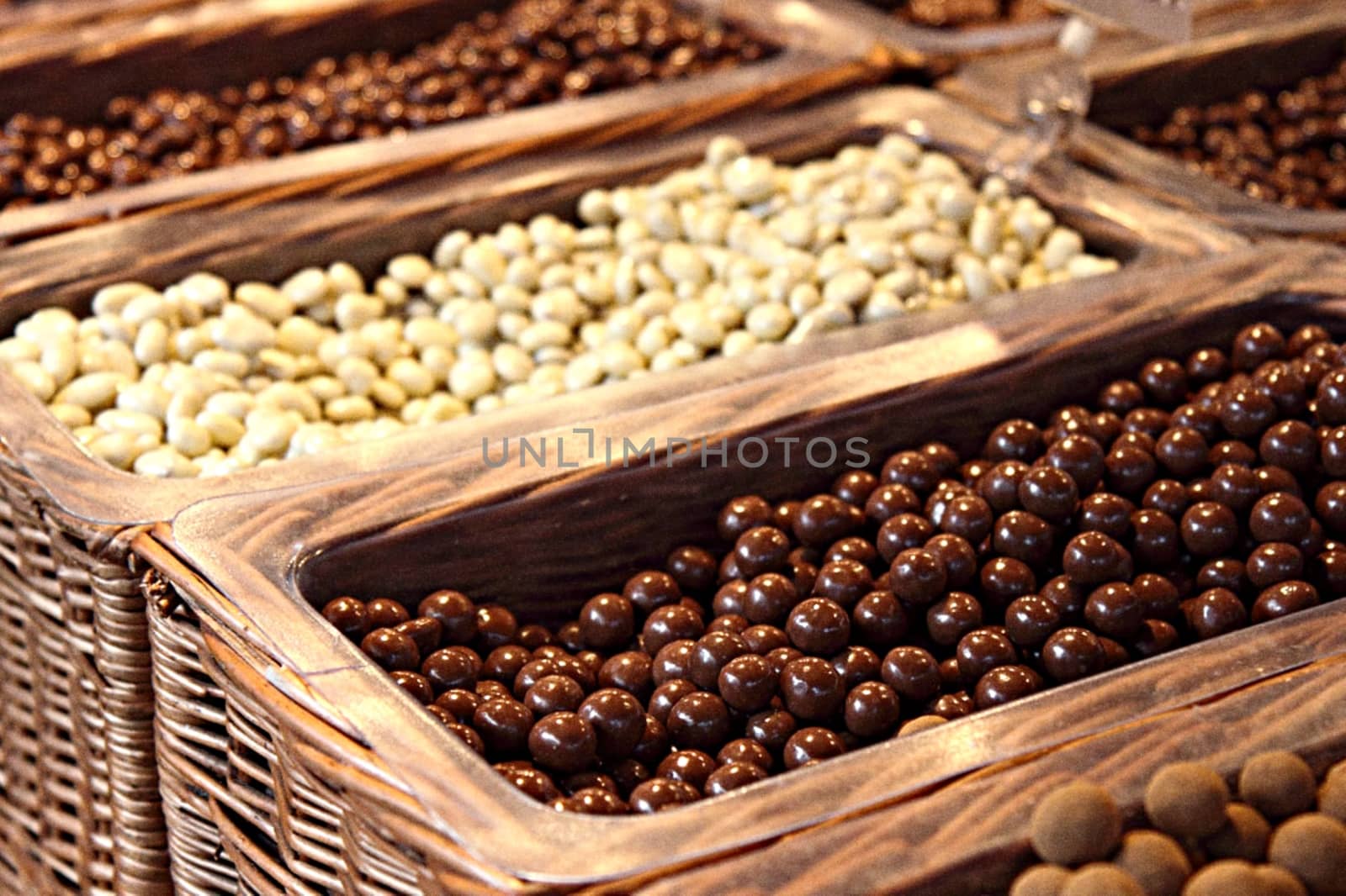 Special chocolate balls in baskets in different flavours. High quality photo