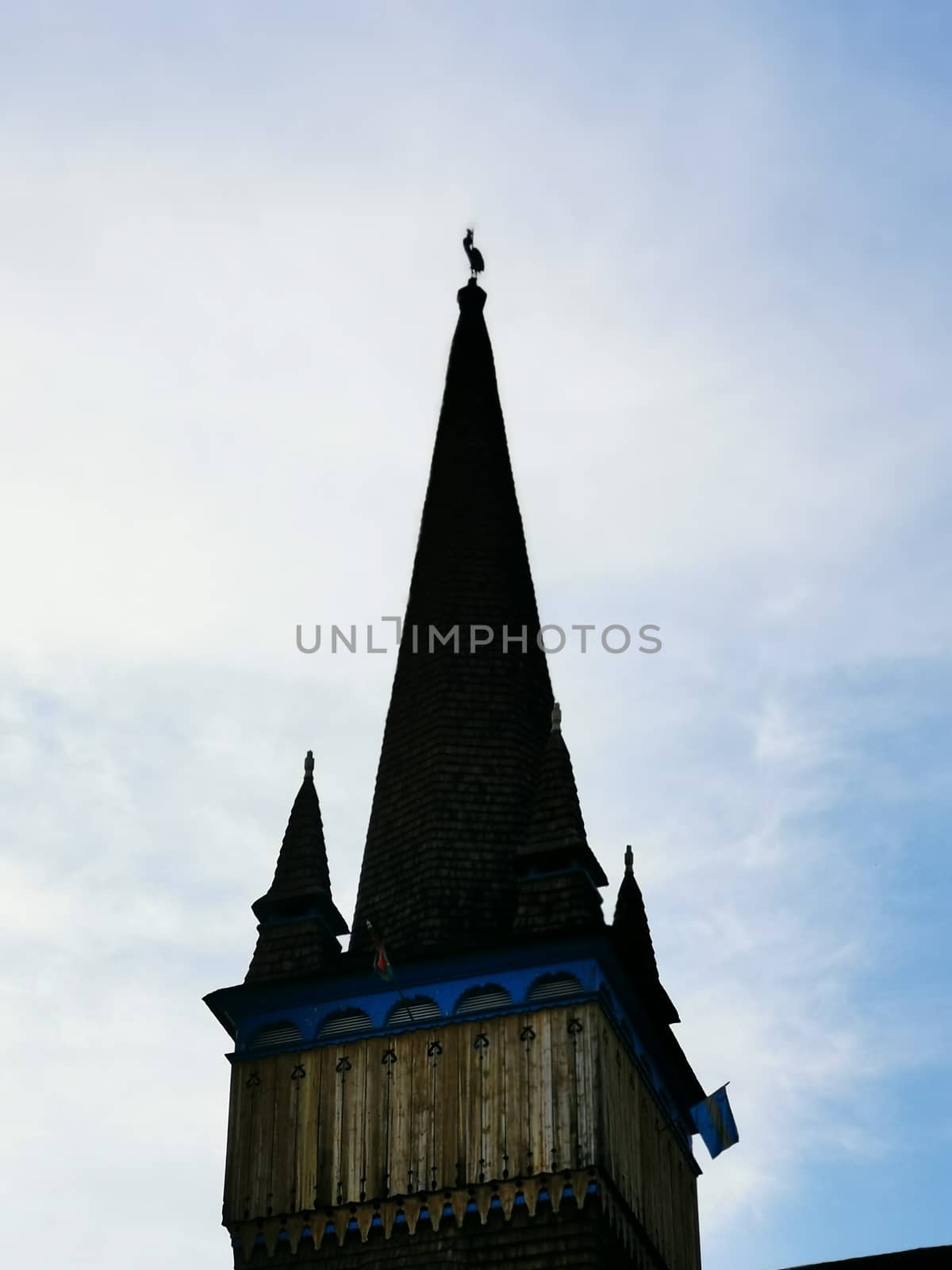A large clock tower in the background. High quality photo