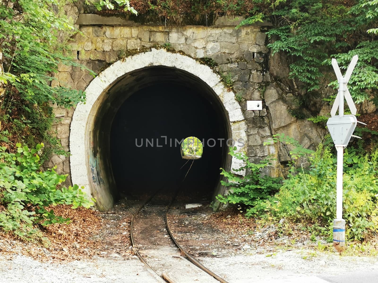 A tunnel in front of a brick wall. High quality photo