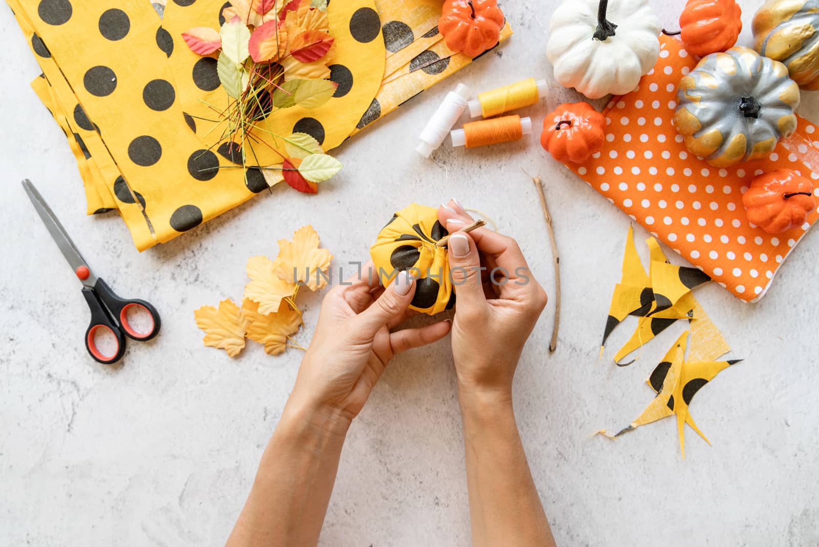 Step by step instruction of making halloween textile DIY pumpkin craft. Step 5 - put a stick to the middle by Desperada