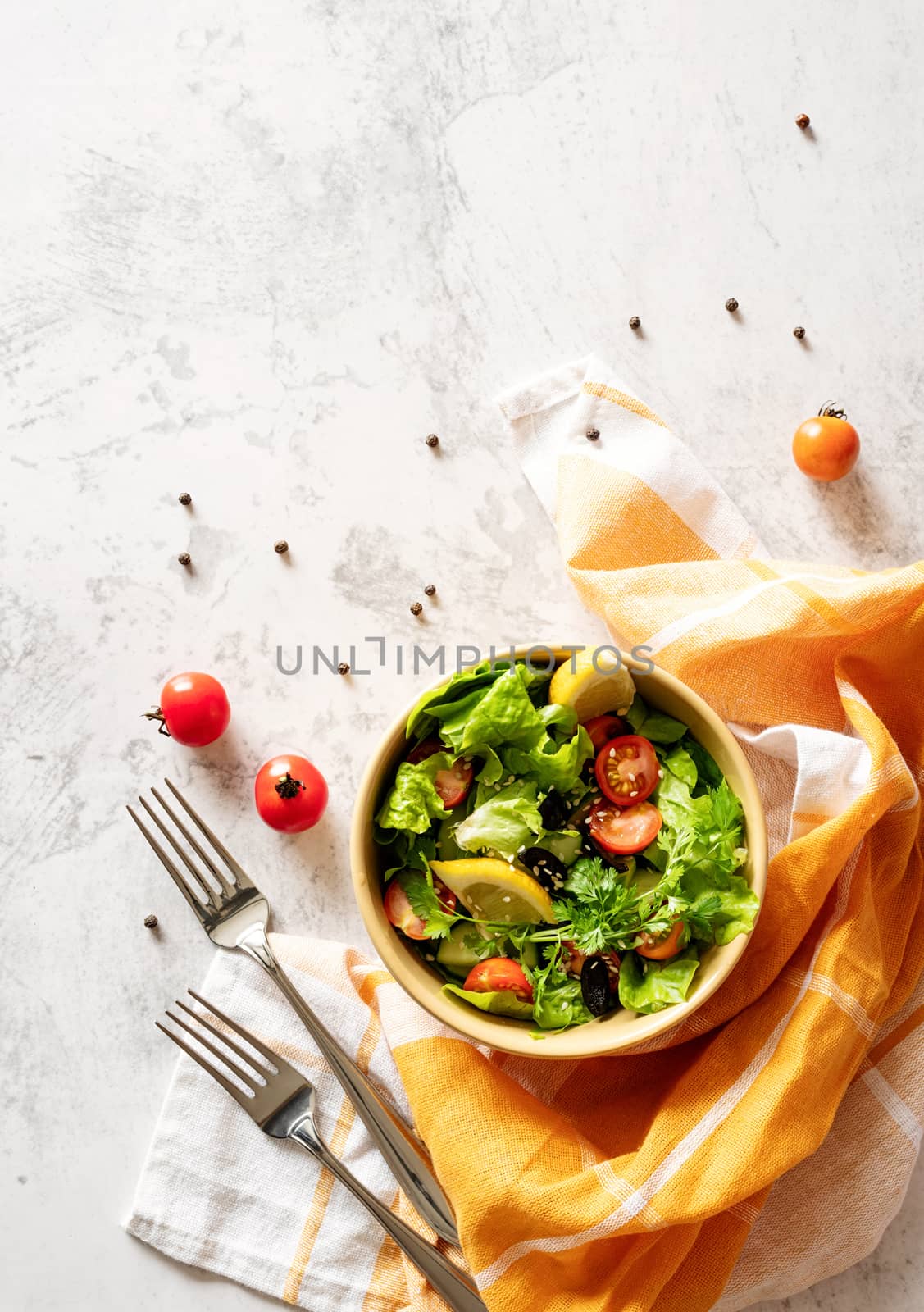 Healthy food concept. A bowl of vegetable mixed salad top view flat lay with copy space