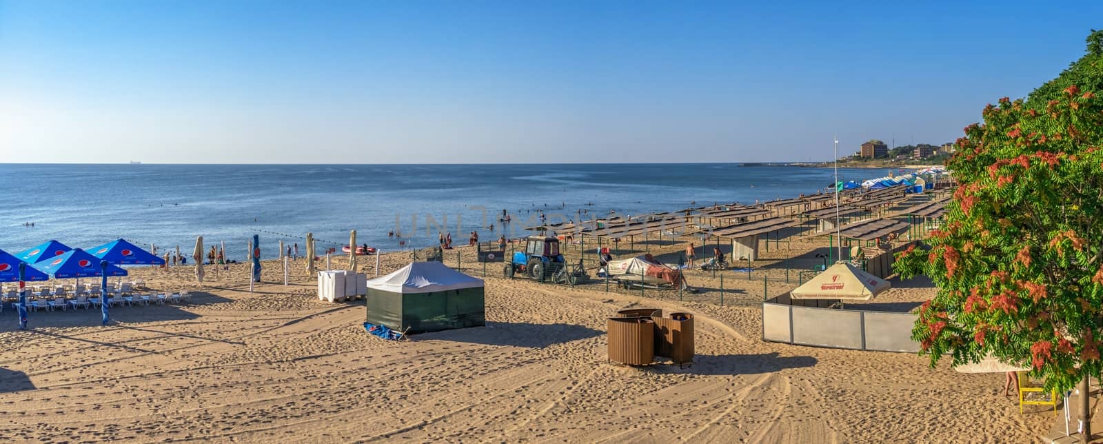 Chernomorsk, Ukraine 08.22.2020. Panoramic view of the Public beach in Chernomorsk city on a sunny summer morning