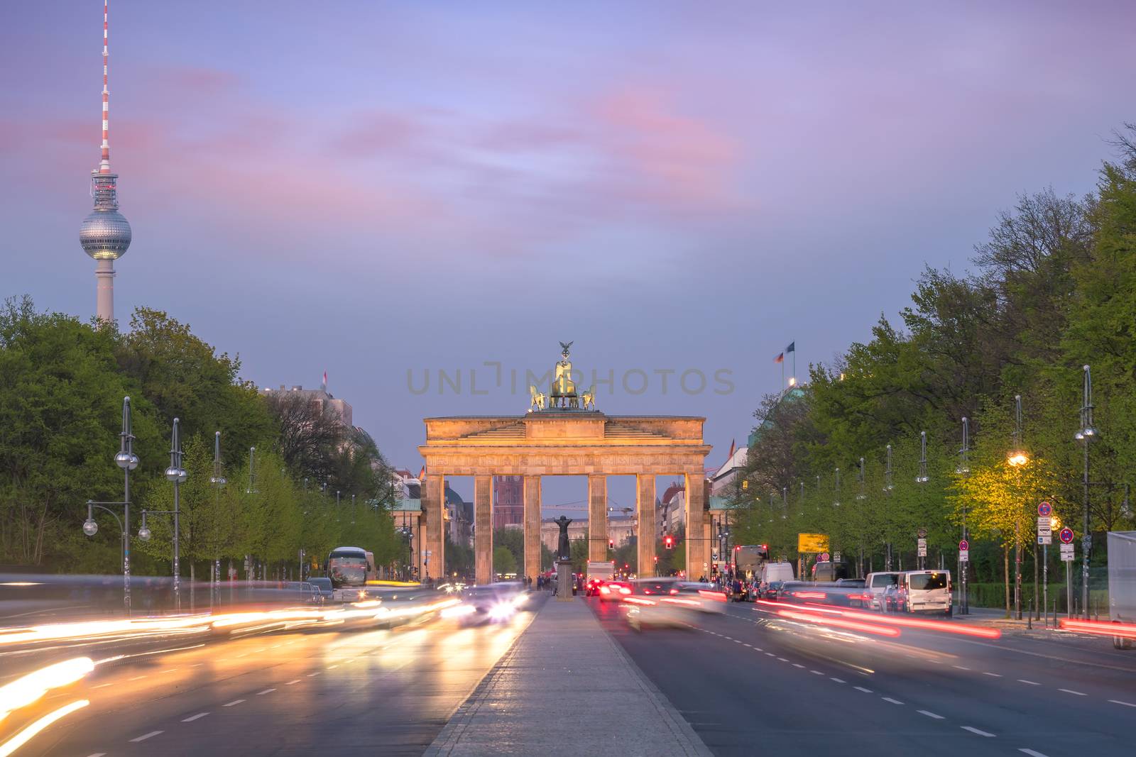 The Brandenburg Gate in Berlin at sunset by f11photo