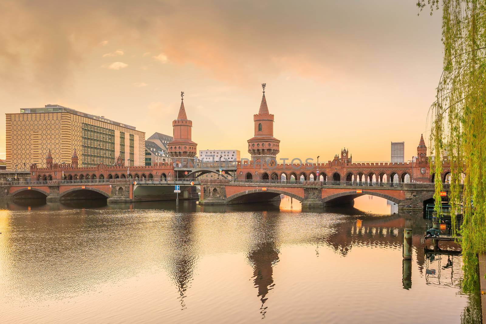 Berlin skyline with Oberbaum Bridge and Spree River, at sunrise, Germany
