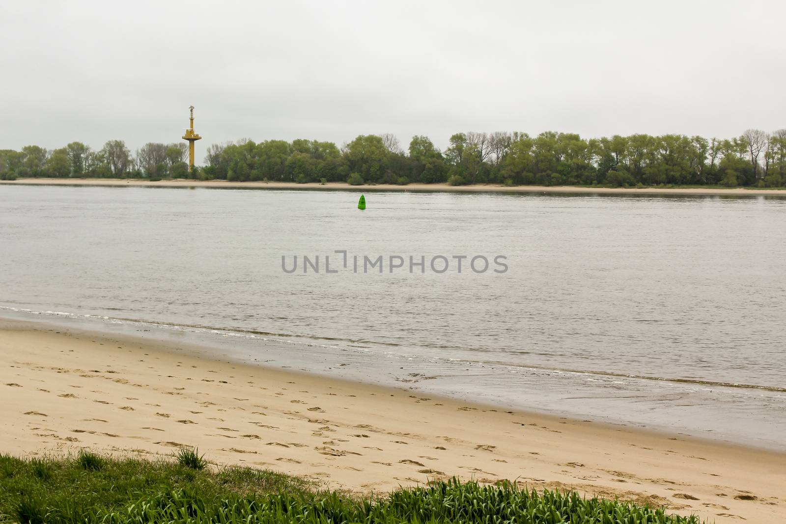 Rough and cold Weser beach in Brake Unterweser Lower Saxony Germany. Harrier Sand.