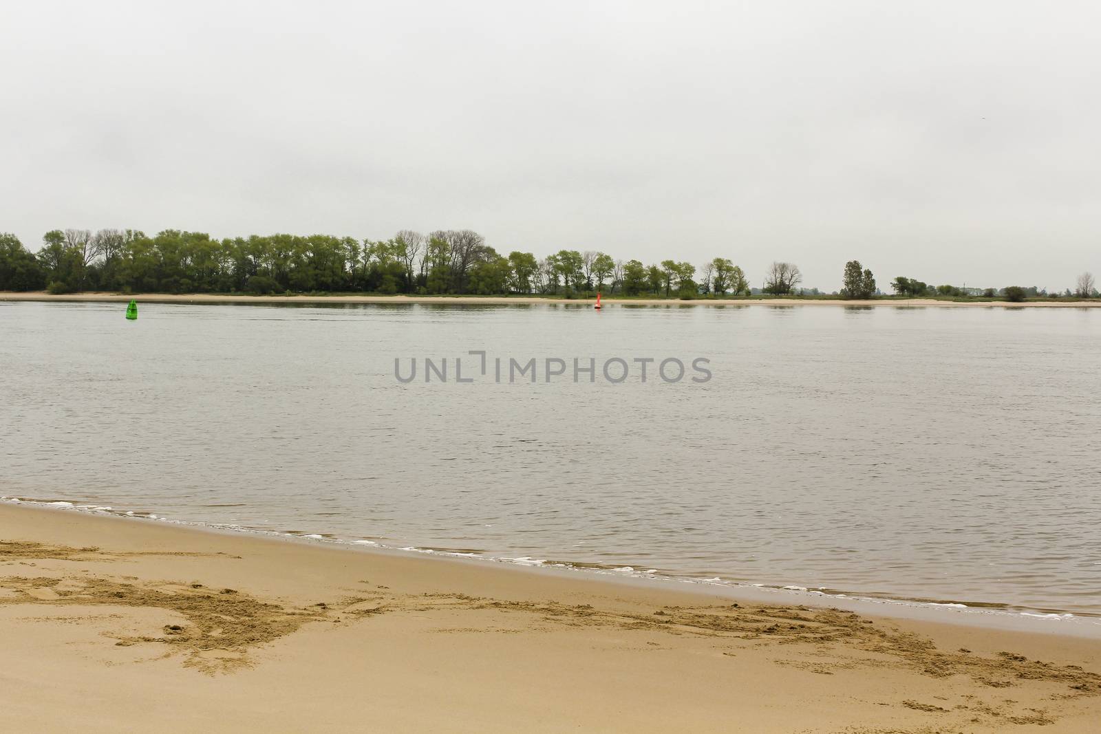 Rough and cold Weser beach in Brake Unterweser Lower Saxony Germany. Harrier Sand.