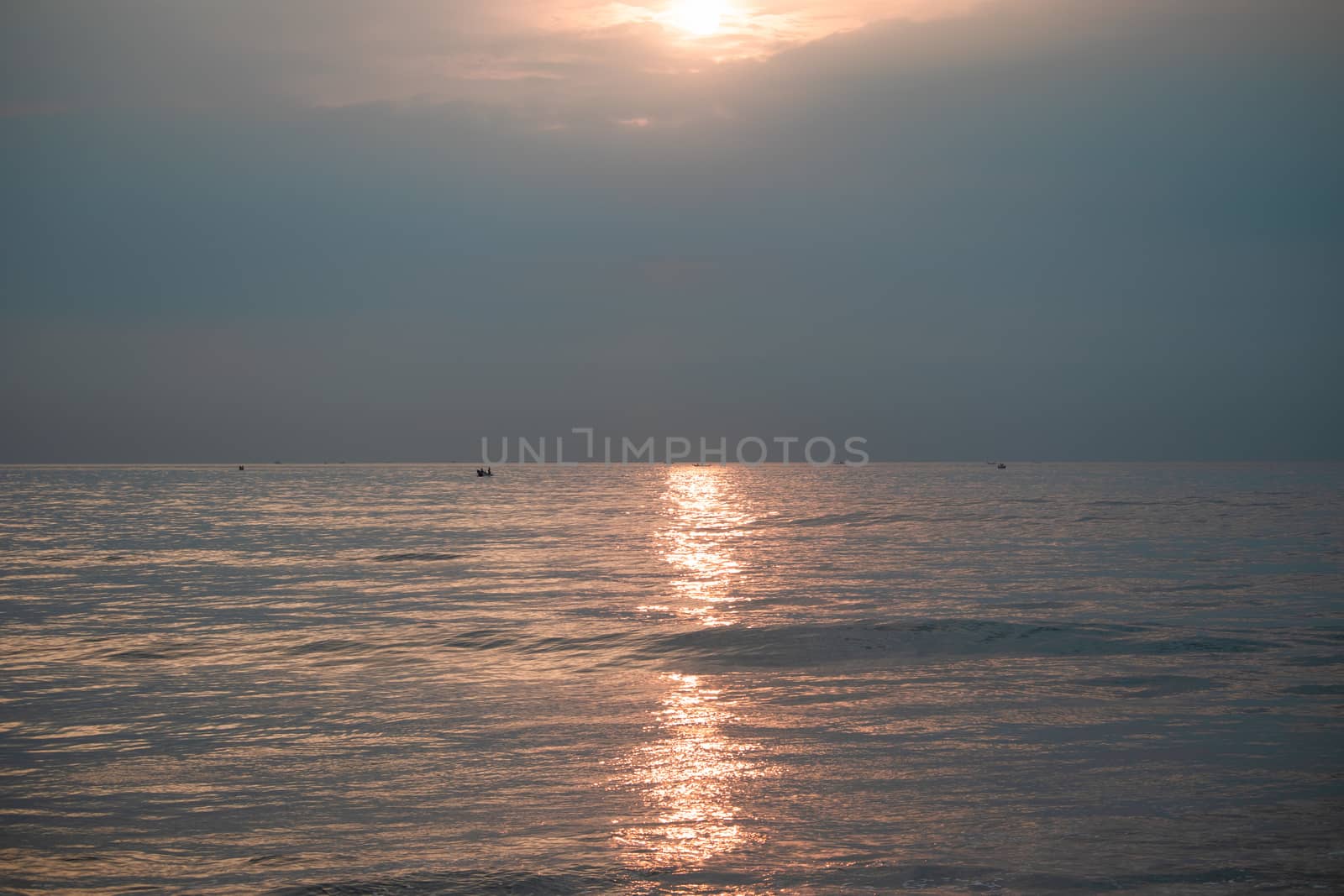 Sunrise in the morning from the clouds at Kovalam beach by 9500102400