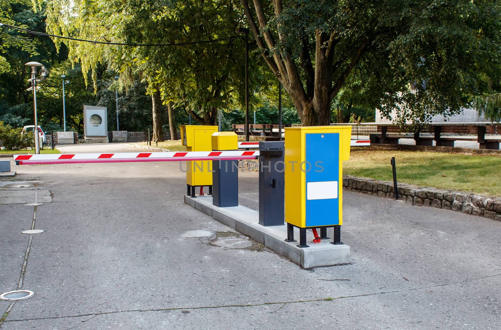 entrance to the parking lot near the city park on sunny summer day