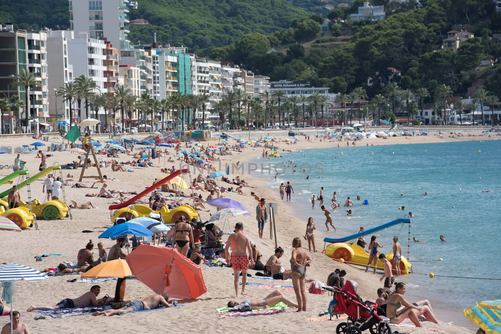 Lloret de Mar, Spain : 2020 2 Sept : People in the beach of Lloret de Mar after Covid 19 without international tourists in summer 2020