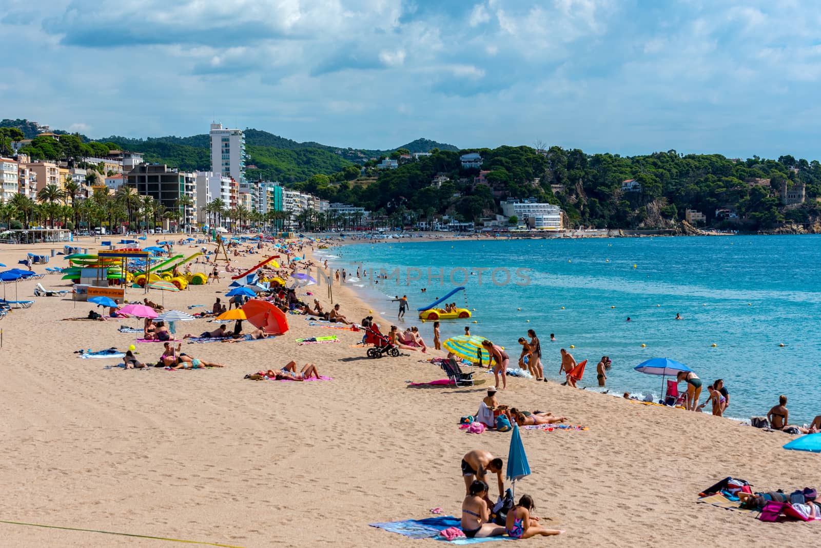 Lloret de Mar, Spain : 2020 2 Sept : People in the beach of Lloret de Mar after Covid 19 without international tourists in summer 2020