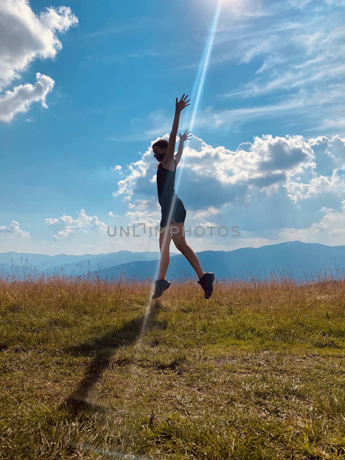 woman, jump, sky, happy, freedom, young, summer, people, grass, blue, jumping, nature, fun, field, joy, happiness, active, beautiful, green, beauty, person, lifestyle, energy, spring, outdoor