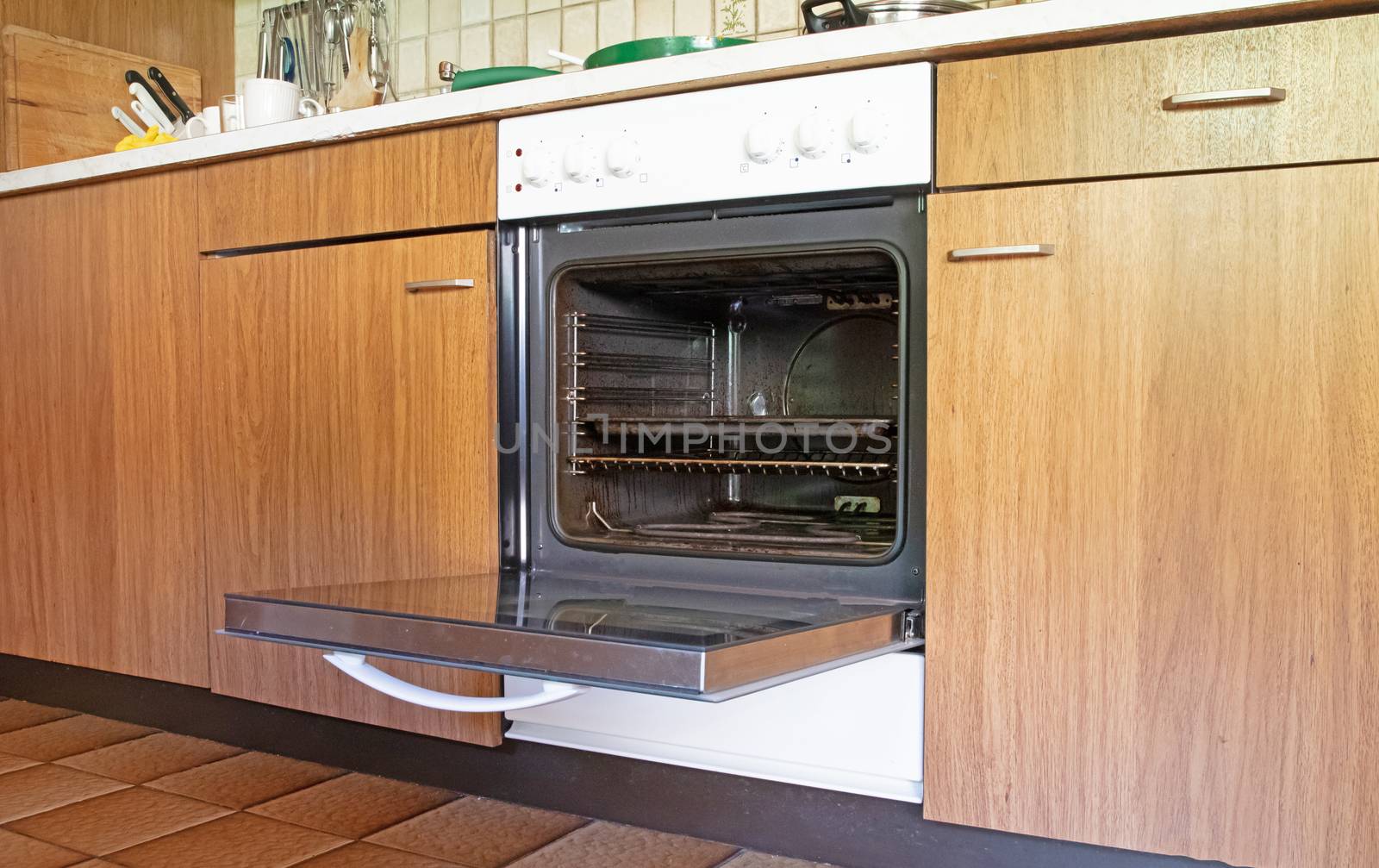 Old antique kitchen with dirty oven