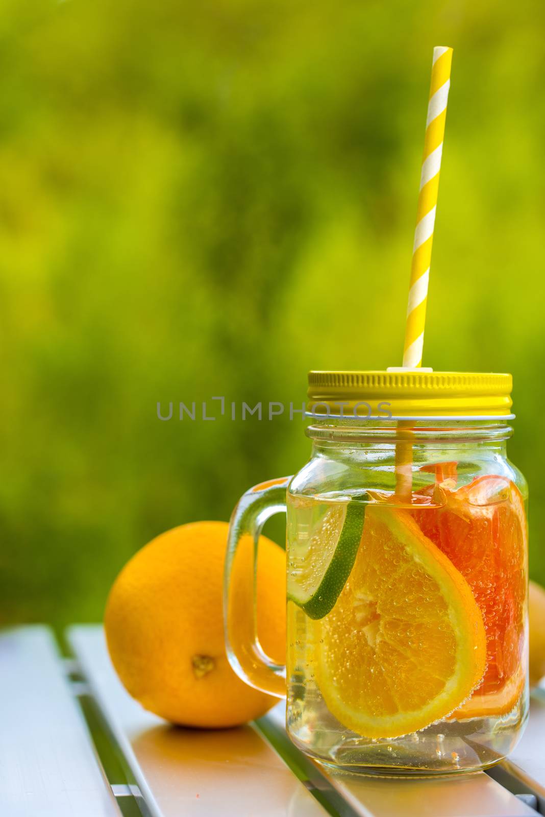 fruit lemonade in jar by Visual-Content