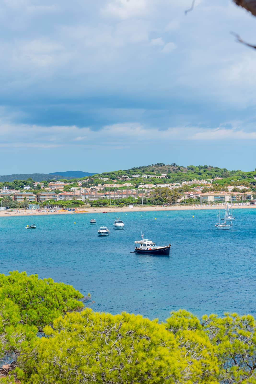 View to Sant Pol beach in the Village of Sant Feliu de Guixols a by martinscphoto