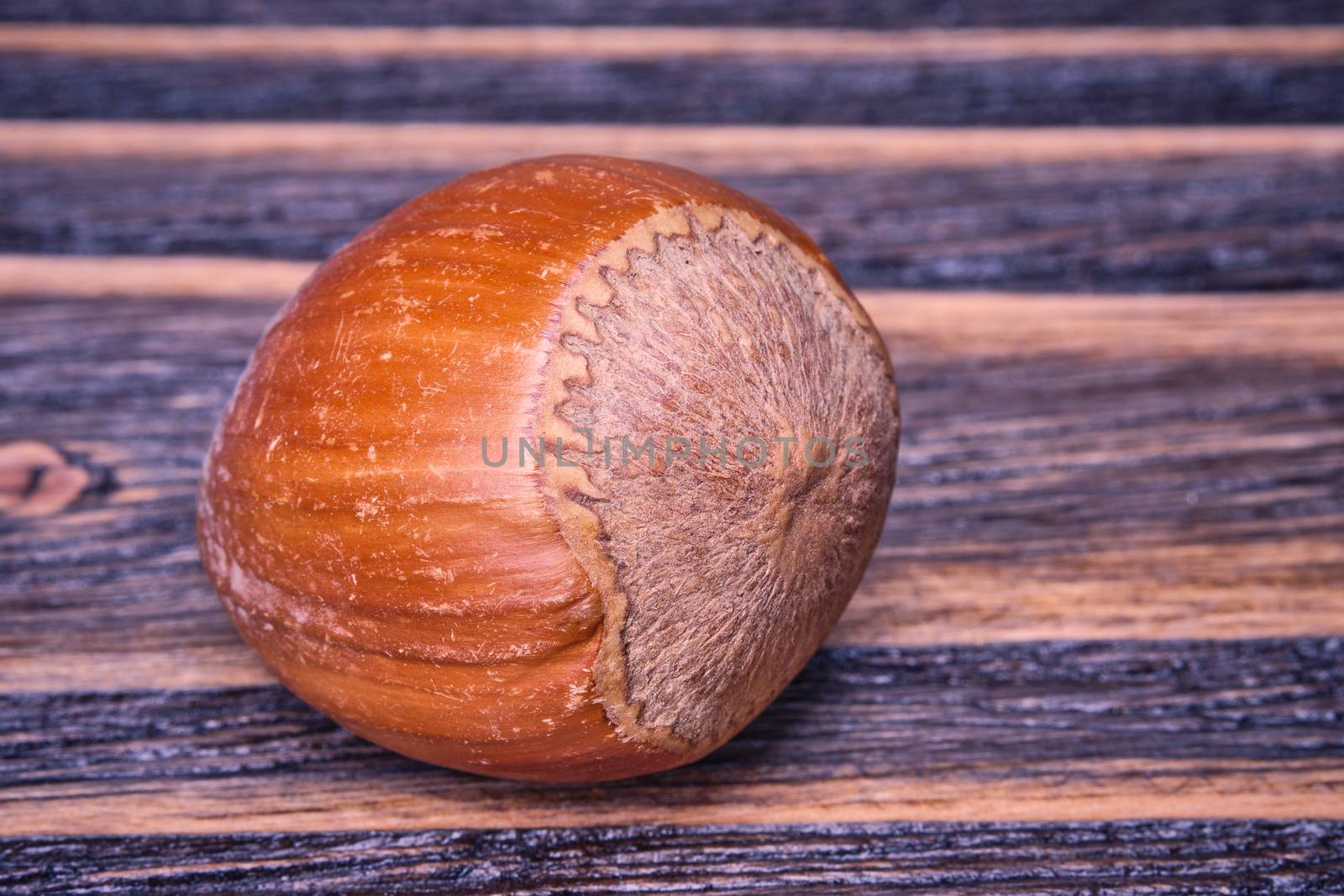 Close up Hazelnuts vegetarian food on old wooden background.