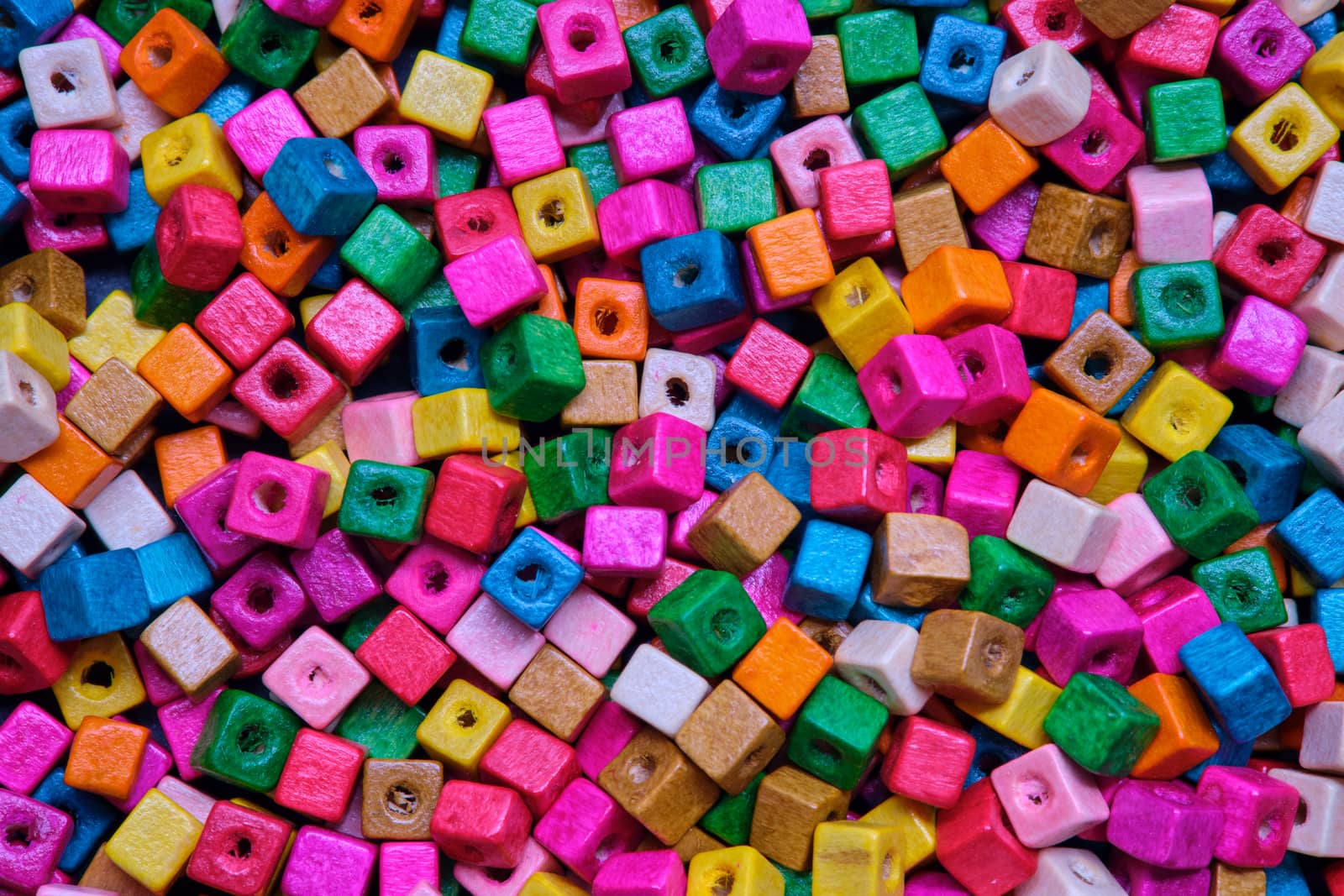 Various sewing Colorful wooden beads as background.