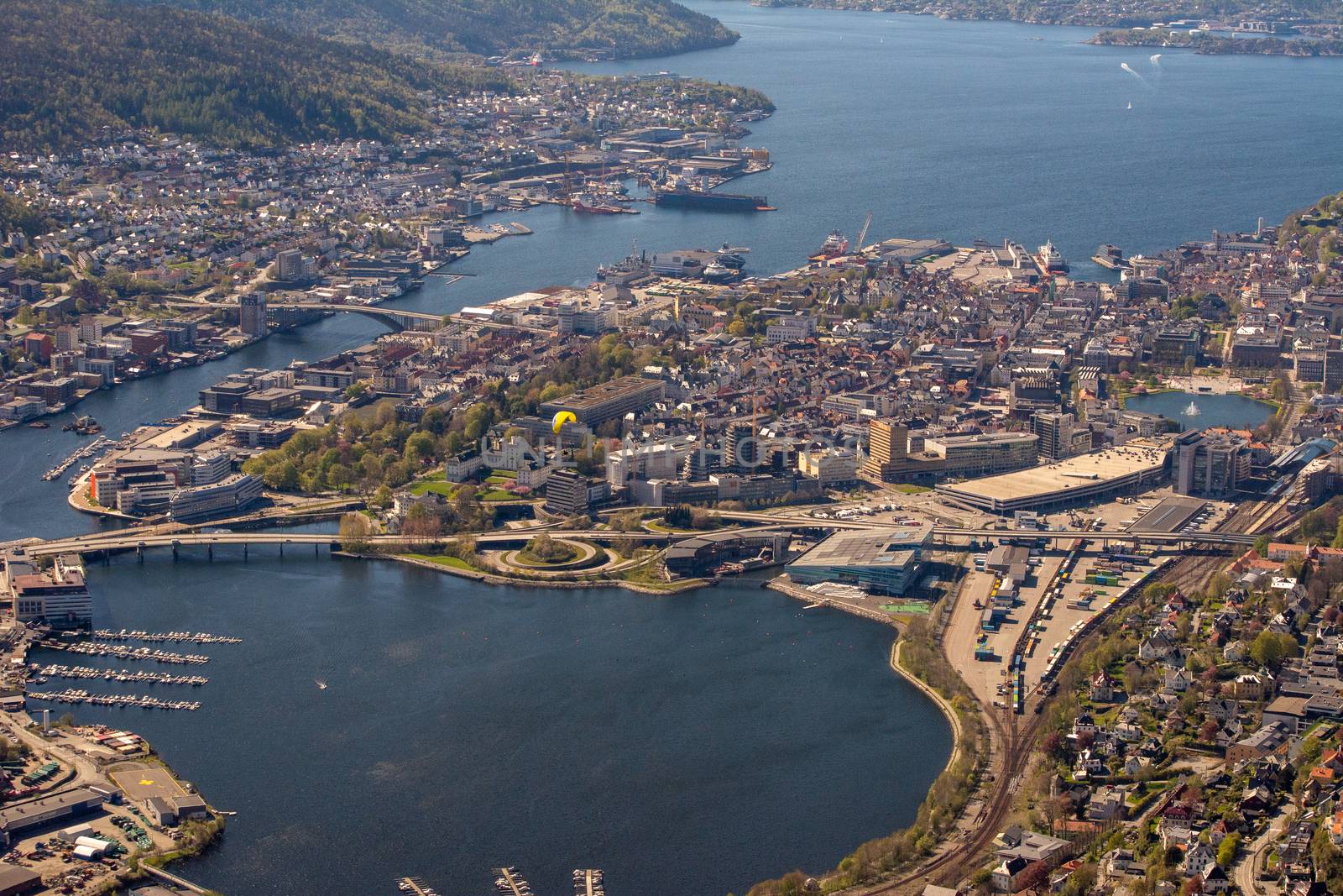 Aerial and high angle view over the city of Bergen, Norway, with districts and surrounding water. Cityscape and skyline.