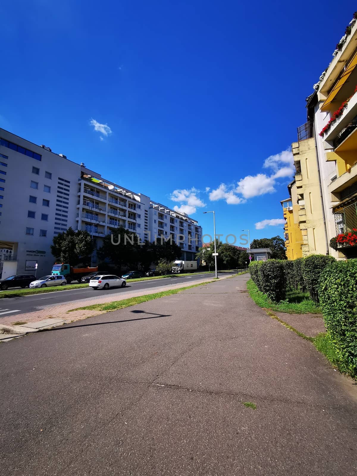 Suburban skyline with cars and panel buildings in Miskolc High quality photo