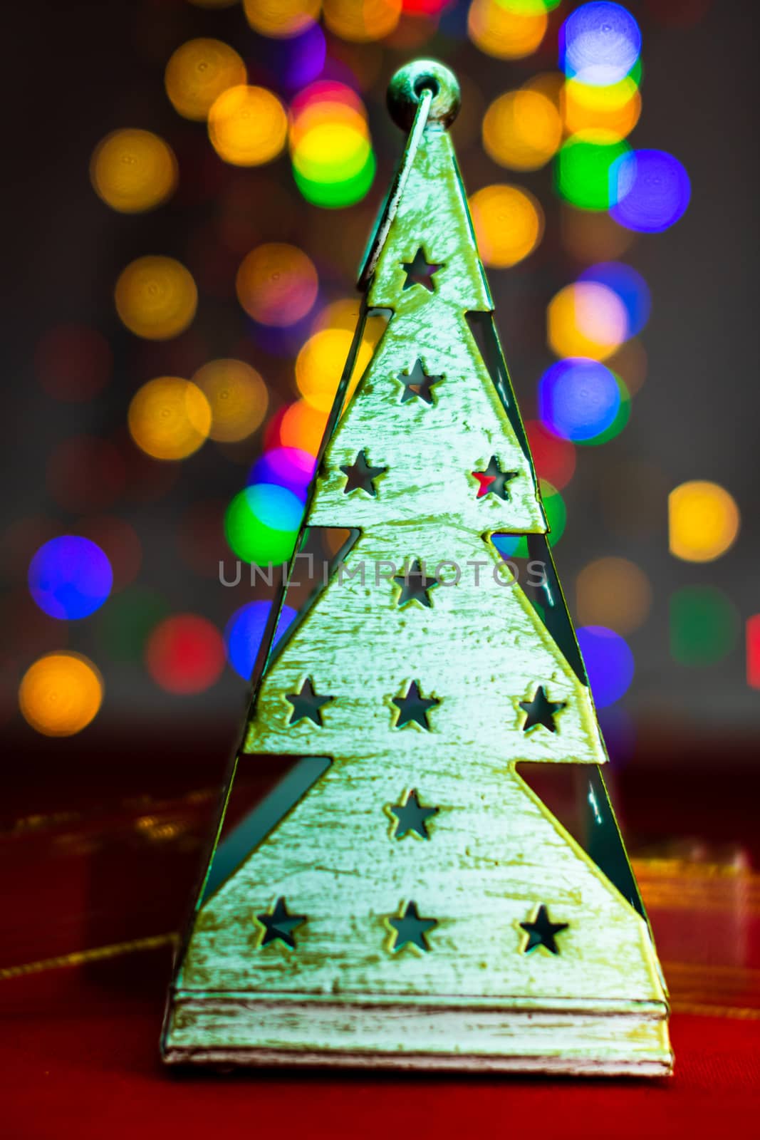 Christmas tree decoration ornament isolated on blurred background of  lights