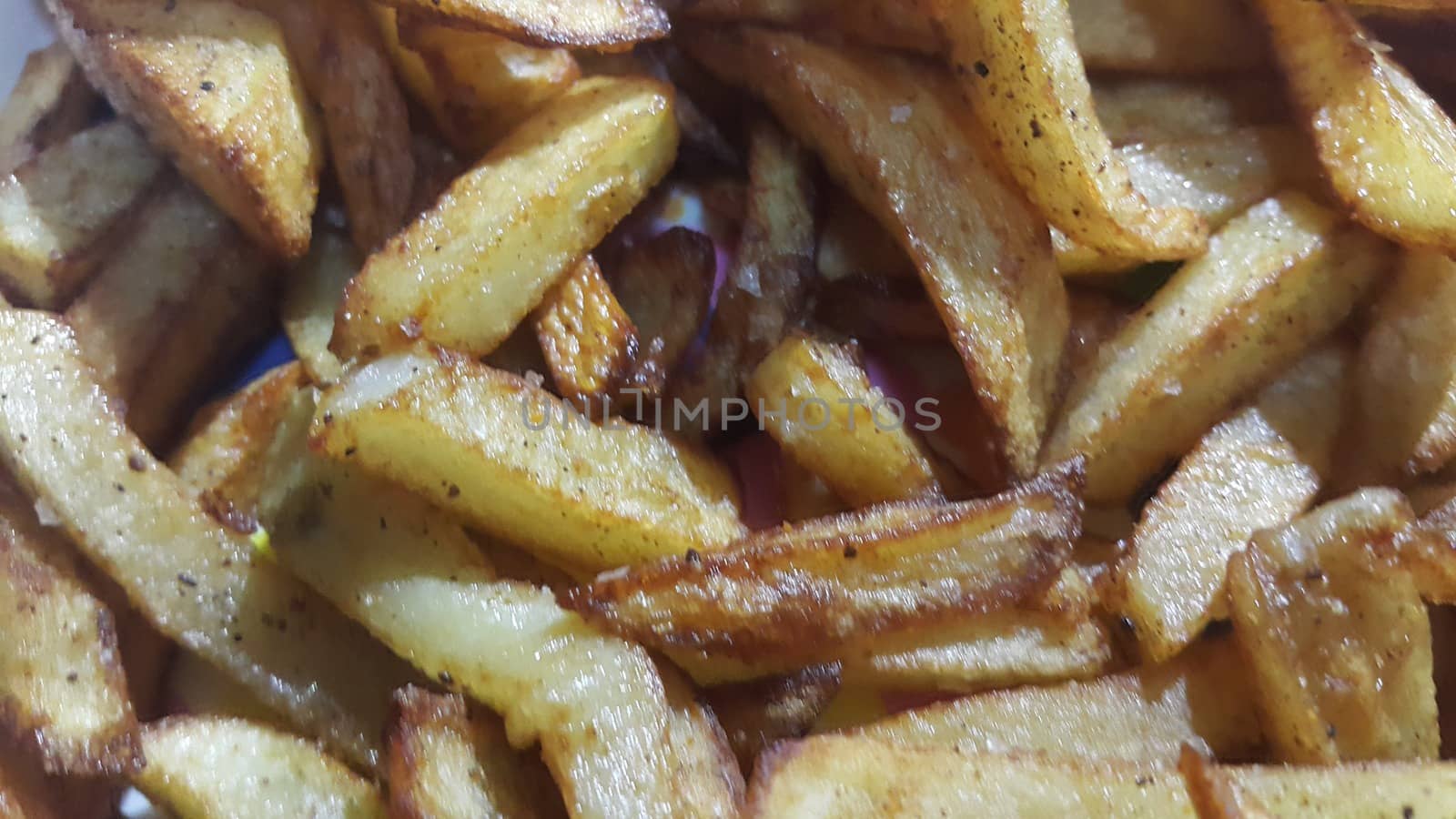 Potato fried or roasted slices on clean background with copy space for text