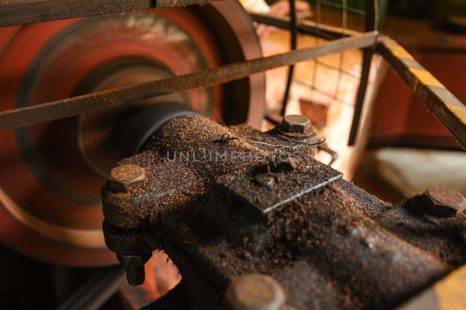 Detail on old rusty motor mechanism, rotor moving, metal axis co by Ivanko