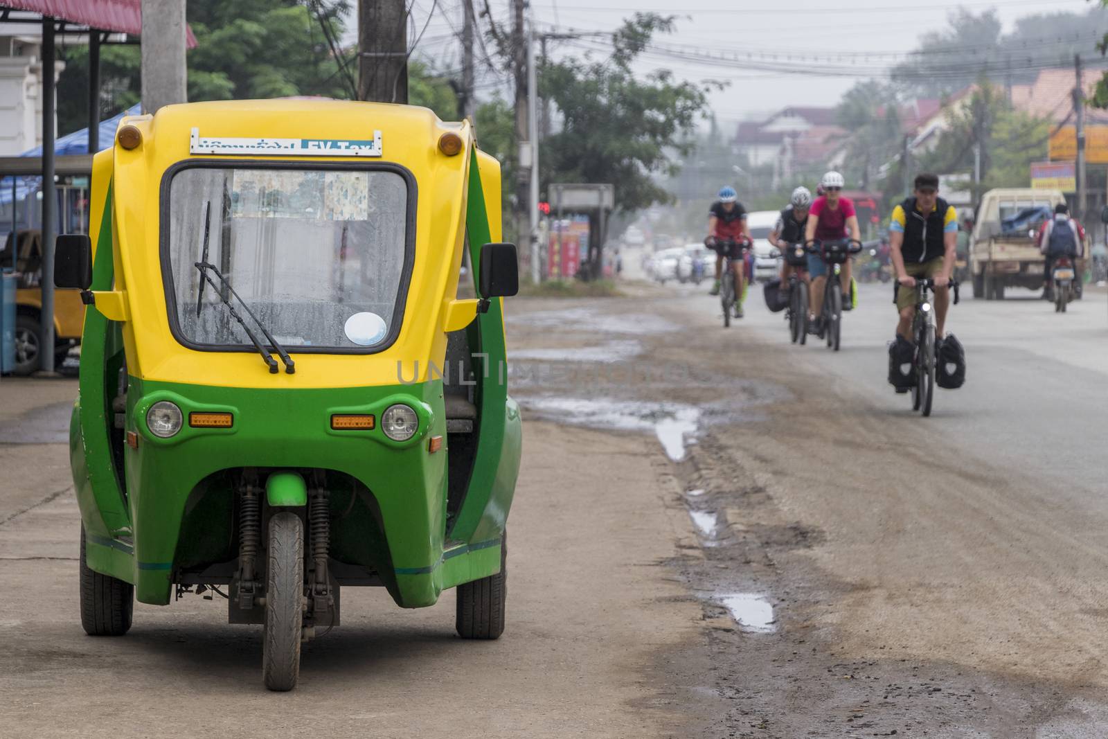 Eco-friendly electronic tuk tuk in Luang Prabang, Laos. by Arkadij