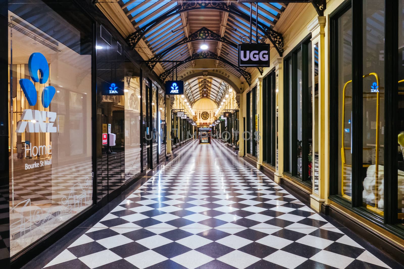 Melbourne, Australia - August 17, 2020: Collins St within Melbourne CBD is quiet and deserted during the Coronavirus pandemic. Melbourne is currently under Stage 4 lockdown and night curfew after a 2nd wave of infections.