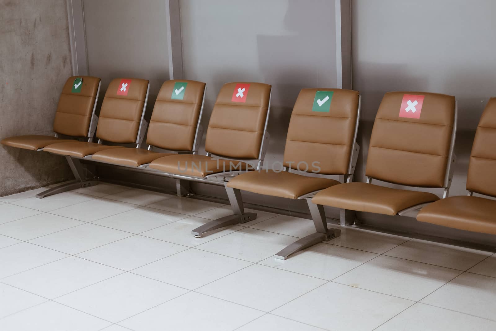 social distancing passenger chair in airport. coronavirus covid-19 pandemic prevention