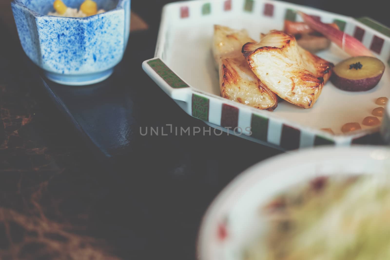 grilled yellow tail fish with salt. japanese lunch food menu set