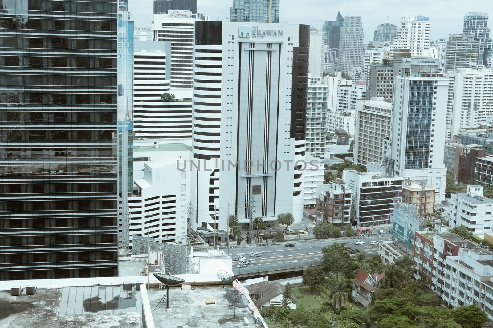 Bangkok, Thailand - August 14, 2020: skyscraper building cityscape in business area near Ploenjit road in Bangkok, Thailand on August 14, 2020.