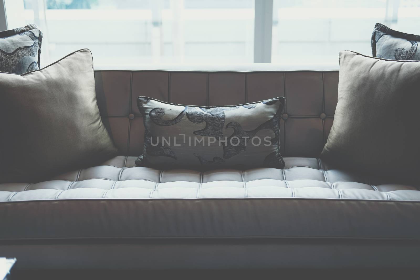 gray sofa chair in living room. home hotel resort interior