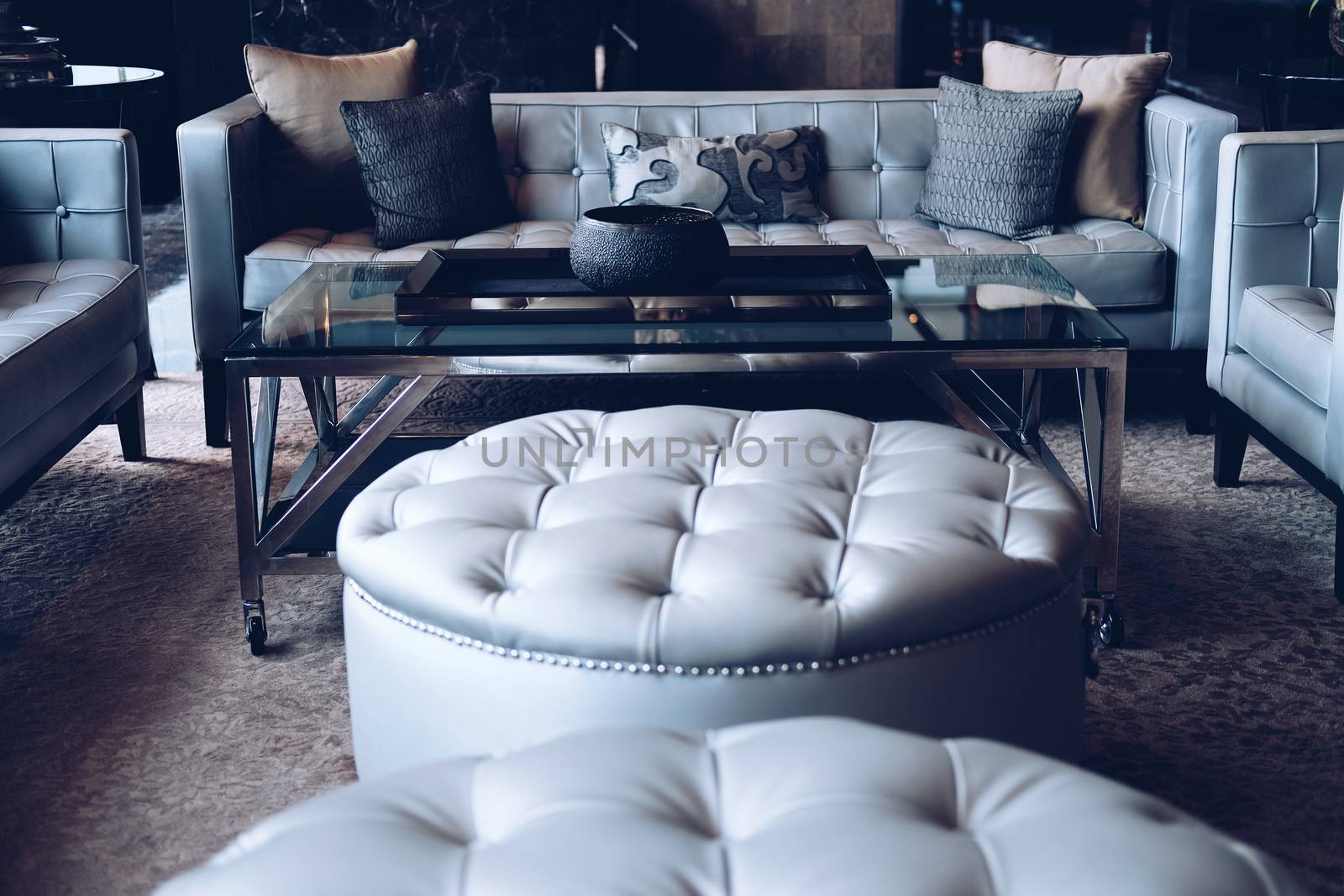 gray sofa chair in living room. home hotel resort interior