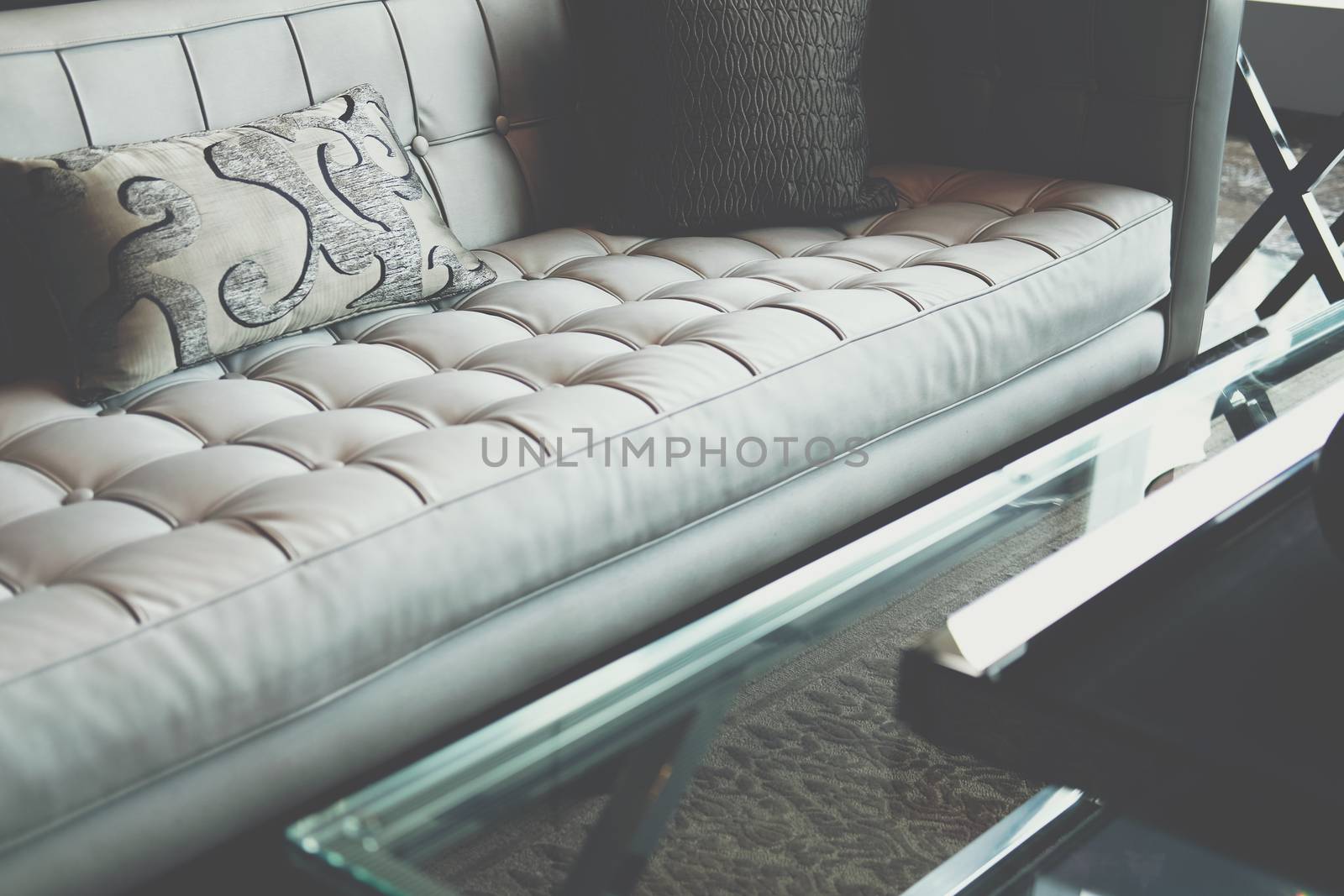 gray sofa chair in living room. home hotel resort interior