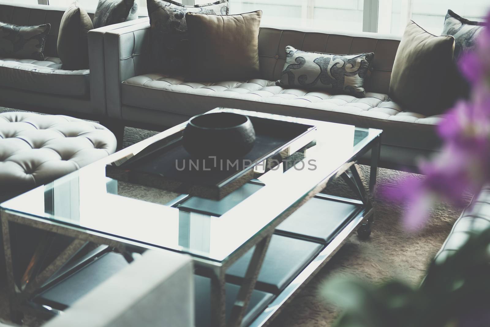 gray sofa chair in living room. home hotel resort interior
