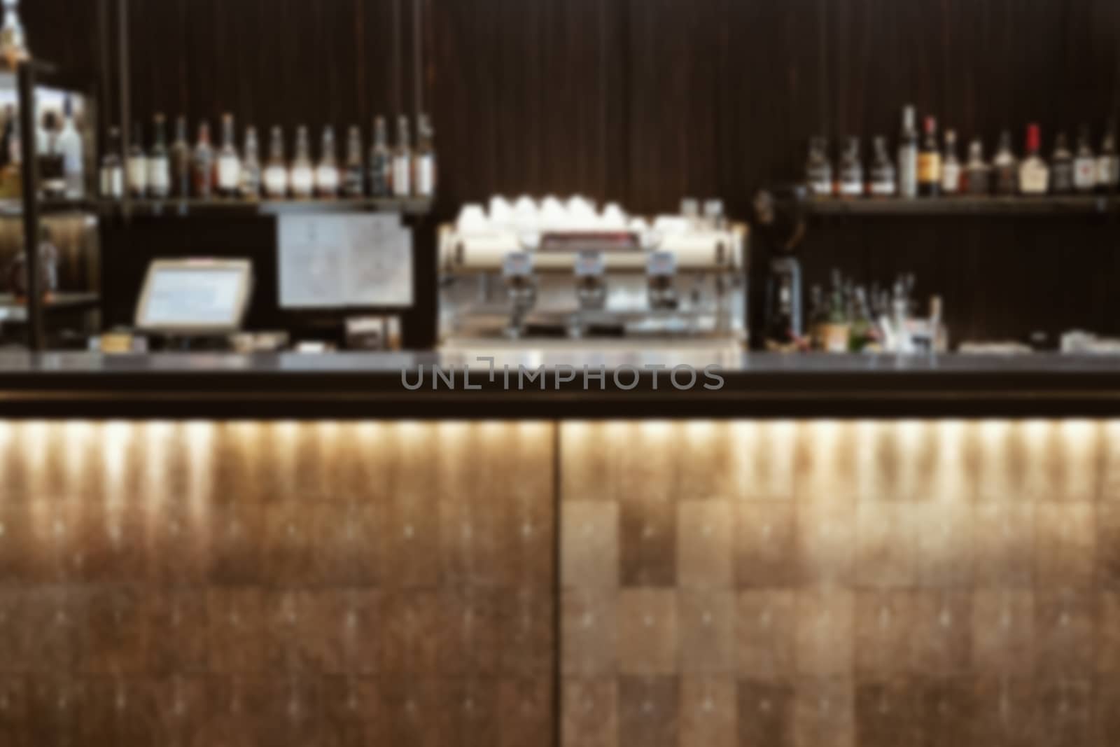 blurry bar pub counter in cafeteria restaurant. defocused blur background