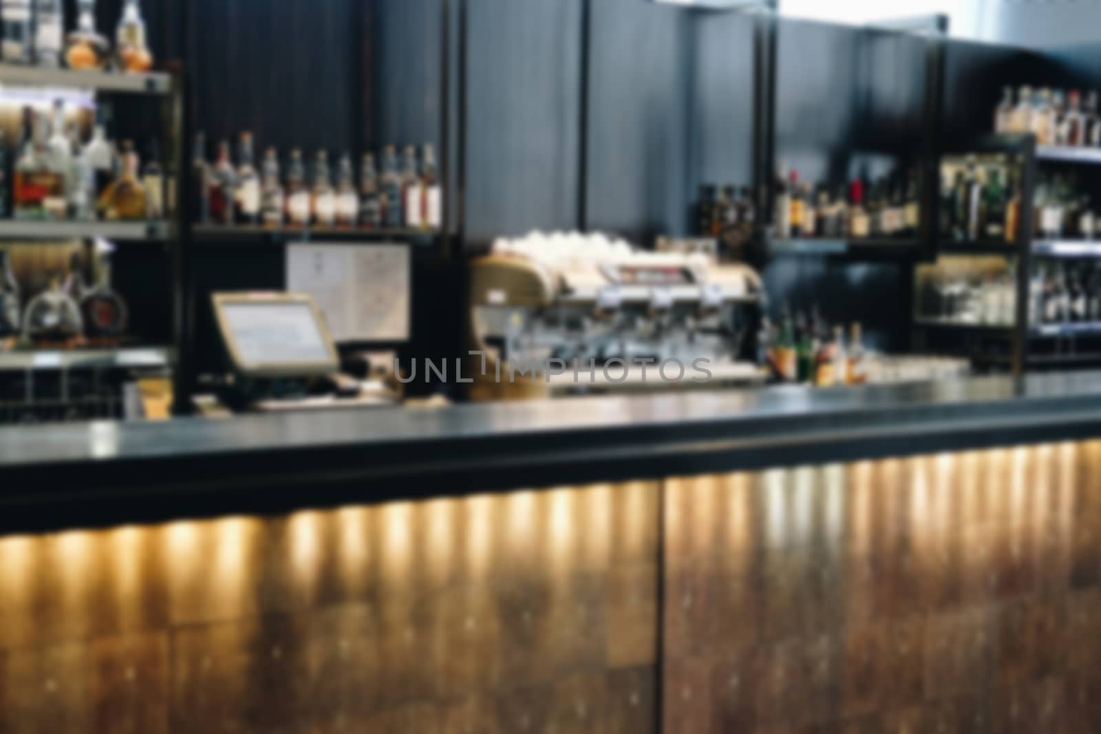 blurry bar pub counter in cafeteria restaurant. defocused blur background