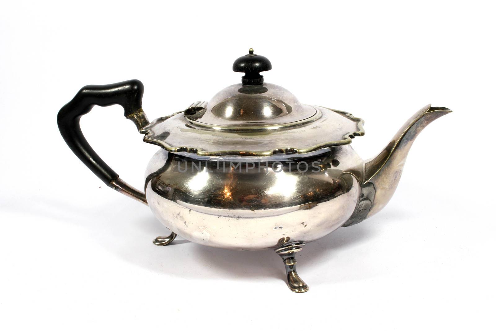 A Vintage Antique Kettle or Tea Pot In Metal on White Background