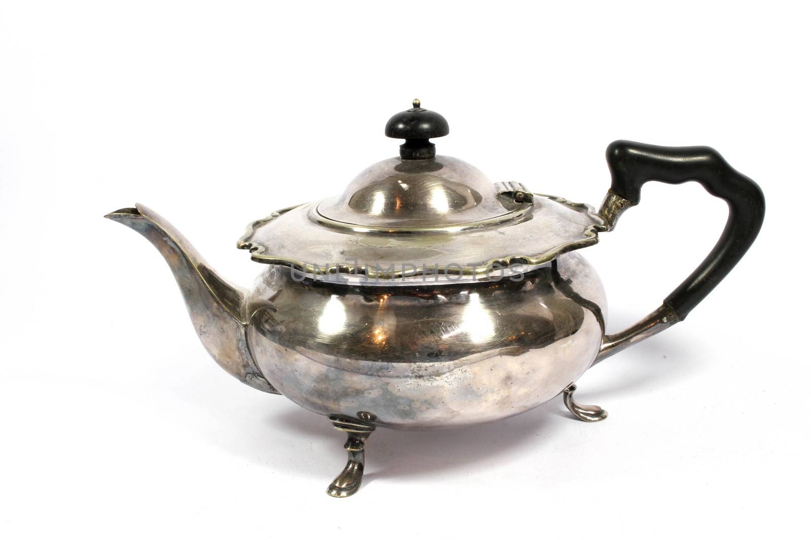 A Vintage Antique Kettle or Tea Pot In Metal on White Background