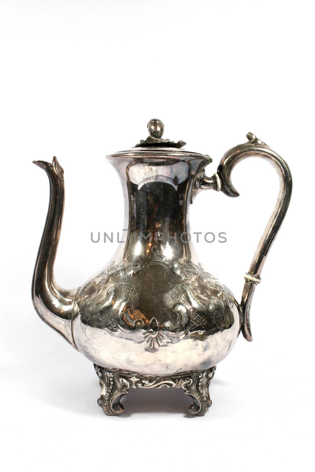 A Vintage Antique Kettle or Tea Pot In Metal on White Background