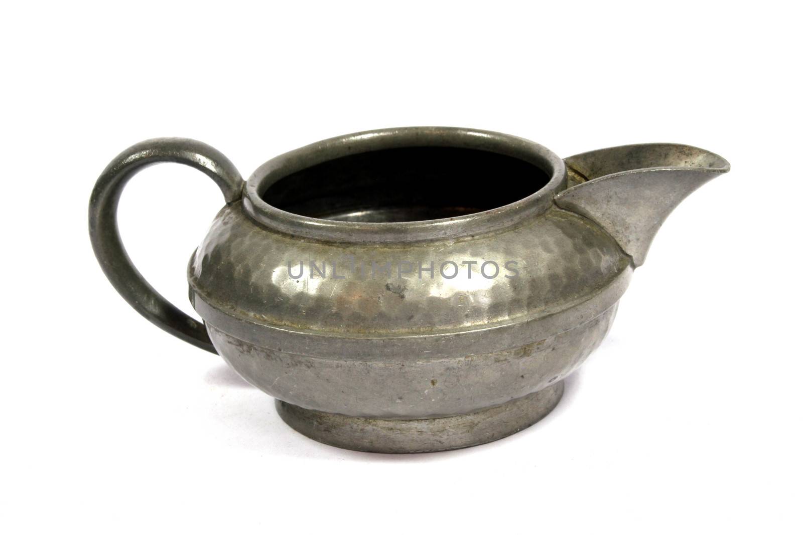 A Vintage Antique Kettle or Tea Pot In Metal on White Background