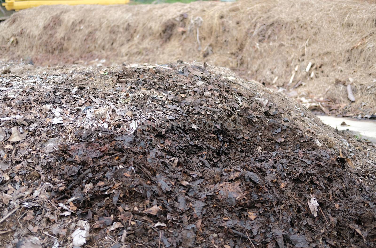 organic compost heap. fertilizer production for soil cultivation in agriculture industry